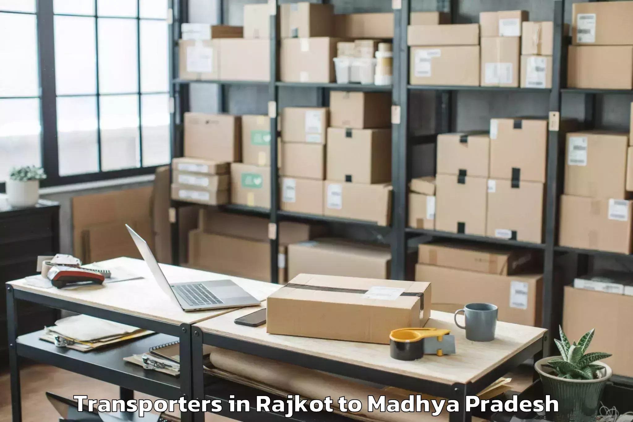 Book Rajkot to Narwar Transporters Online